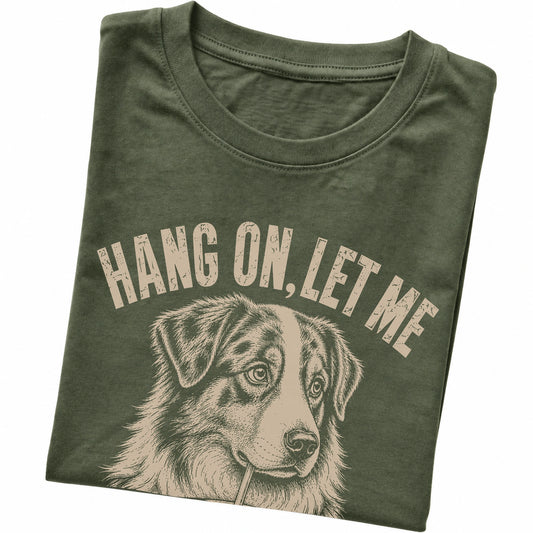 Military Green T-shirt featuring Overthinking Australian Shepherd, folded presentation