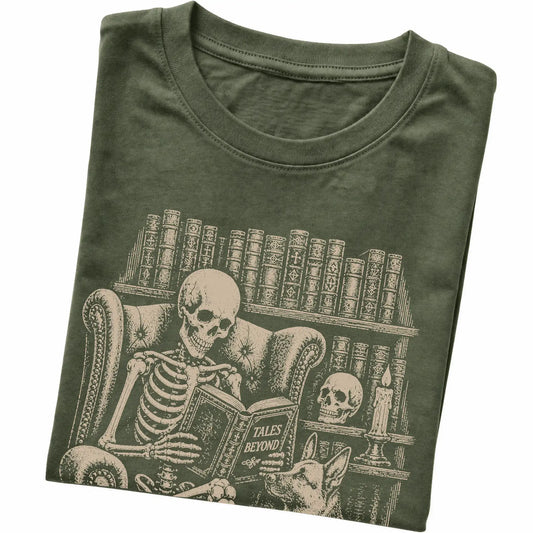 Folded Military Green T-shirt with a skeleton reading Tales Beyond to a German Shepherd