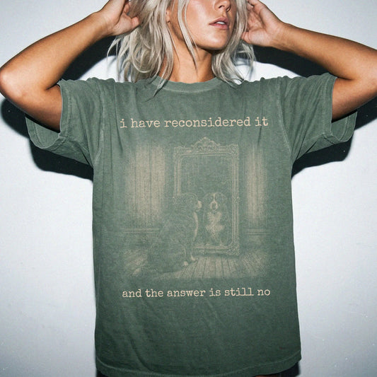 Model wearing a Moss Comfort Colors® T-shirt with “the answer is still no” bernese mountain dog design