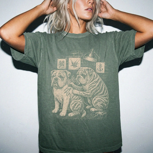 Person wearing a Moss Bulldog Tattoo t-shirt