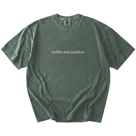 “coffee and poodles” retro text on a Moss Comfort Colors® T-shirt