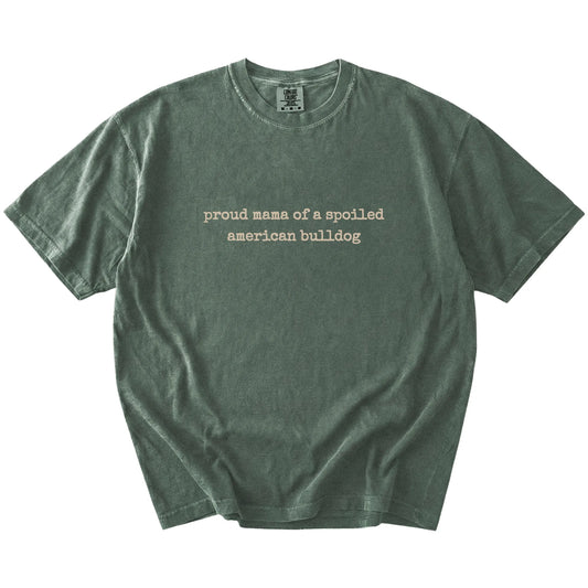 Proud Mama of a Spoiled American Bulldog lettering on a Moss Comfort Colors® T-shirt