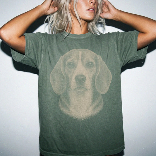 Model wearing a Moss Comfort Colors® T-shirt with a realistic drawing of a Beagle
