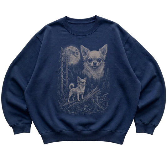 Chihuahua Moonlit Forest graphic on a navy crewneck sweatshirt laid flat