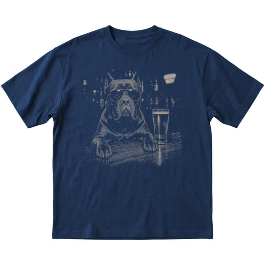 Navy Cane Corso at a bar beside a pint, laid flat