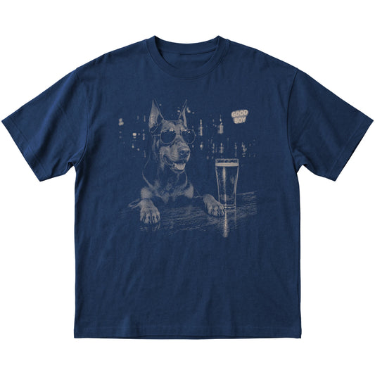 Navy Doberman at a bar beside a pint, laid flat