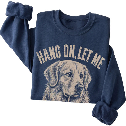 Navy crewneck sweatshirt featuring Overthinking Golden Retriever, folded presentation