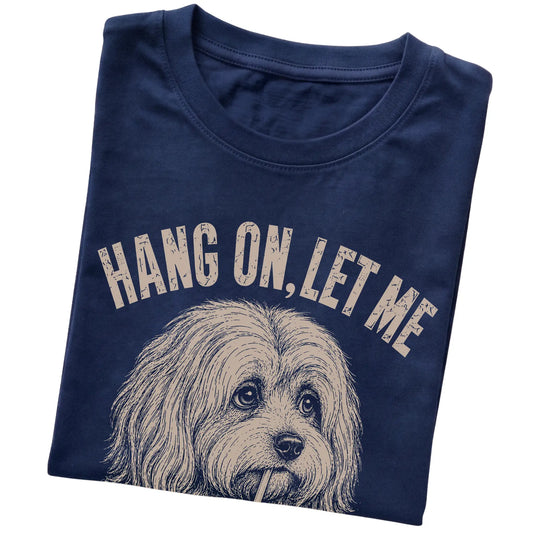 Navy T-shirt featuring Overthinking Havanese, folded presentation