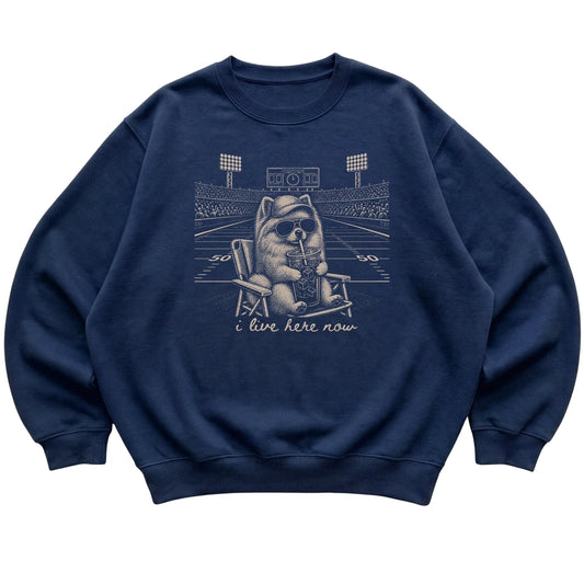 Navy I live here now Pomeranian sweatshirt, laid flat
