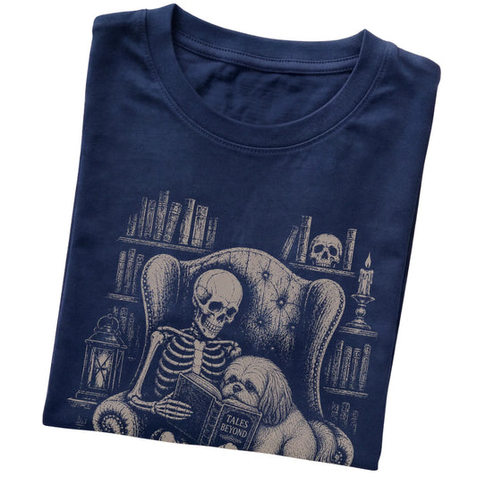 Folded Navy T-shirt with a skeleton reading Tales Beyond to a Shih Tzu