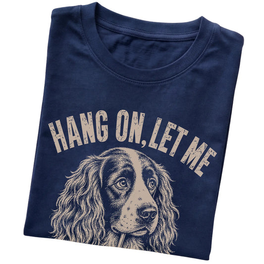 Navy T-shirt featuring Overthinking Springer Spaniel, folded presentation