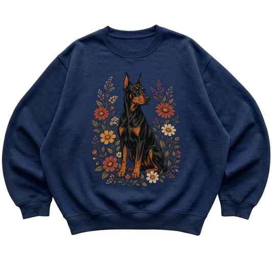 Navy crewneck sweatshirt with Doberman portrait and wildflowers, flat lay