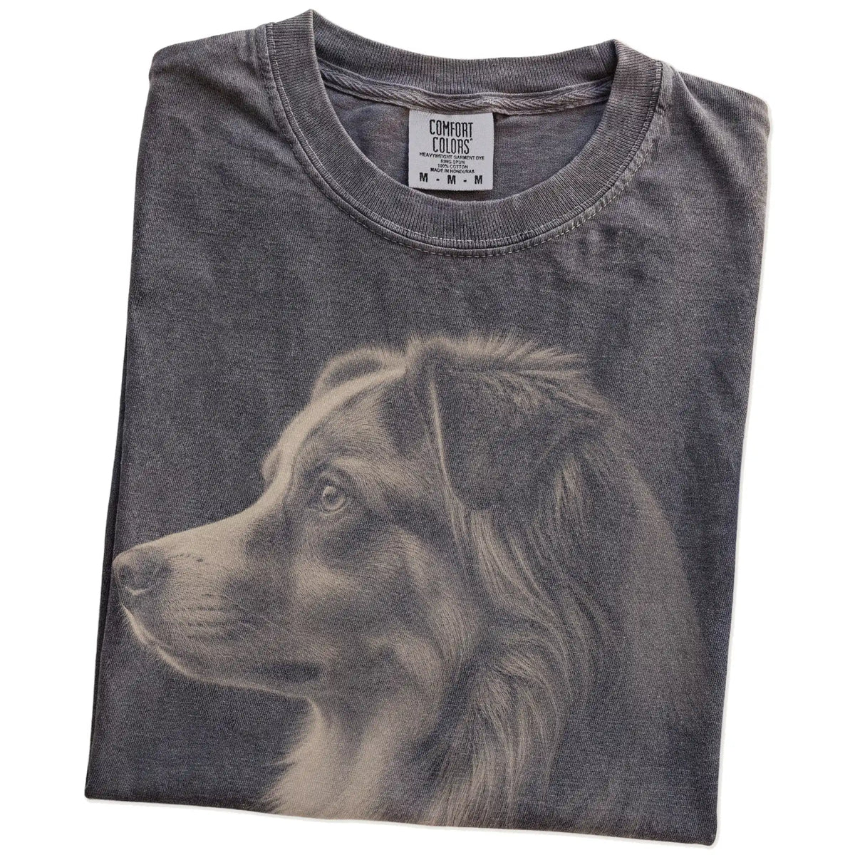 Folded Pepper Comfort Colors® T-shirt showing a detailed photographic portrait of a Australian Shepherd