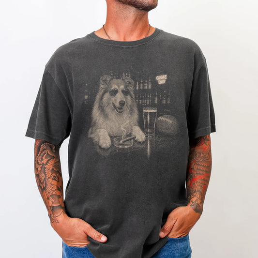 Model wearing a Pepper Comfort Colors® T-shirt featuring Collie with beer and football graphics