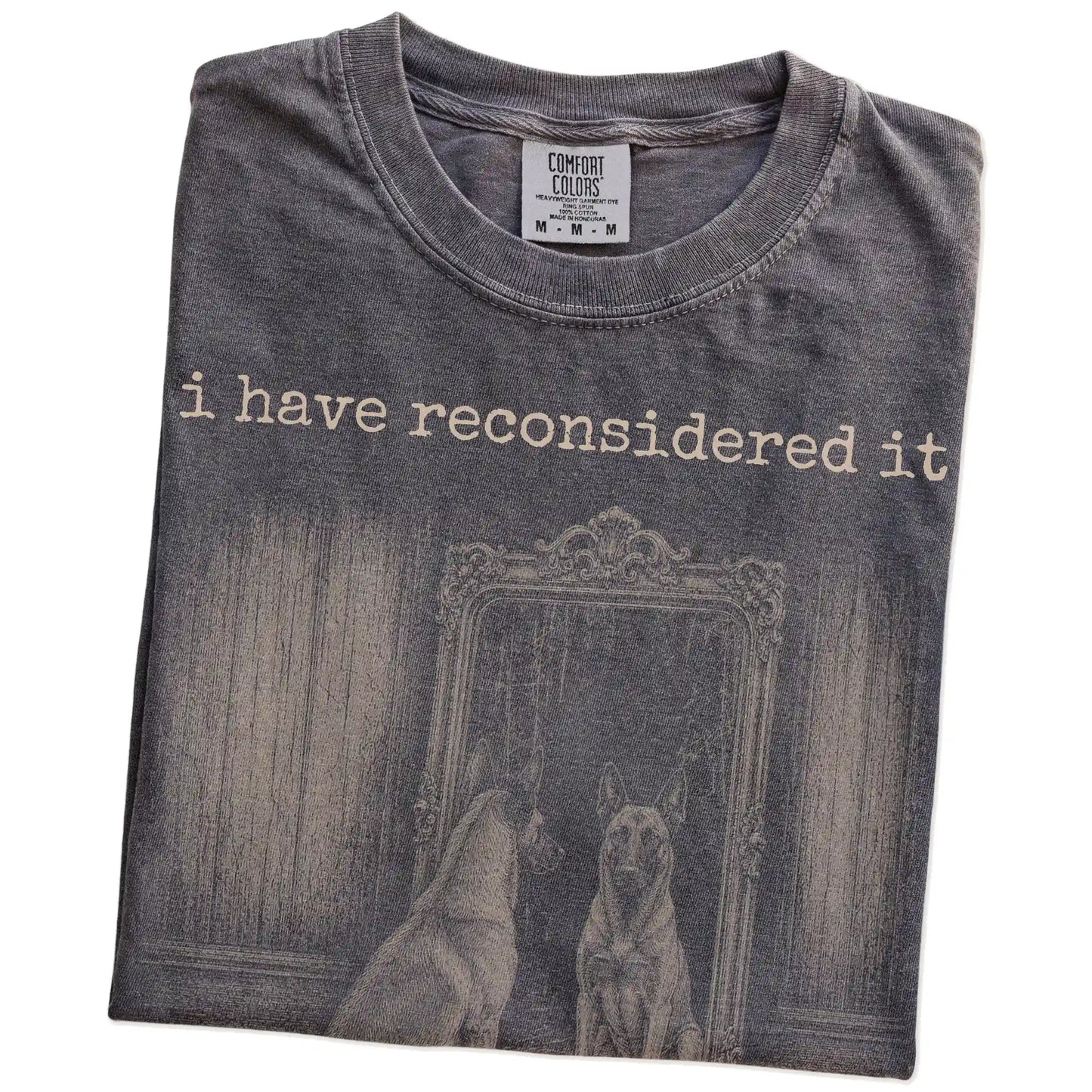 Folded Pepper Comfort Colors® T-shirt showing “the answer is still no” belgian malinois design