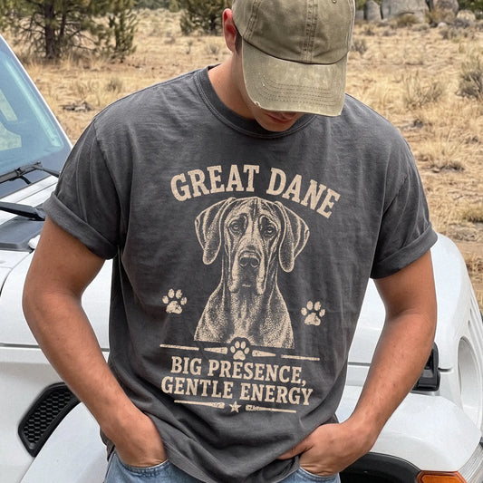 Model wearing a Pepper Comfort Colors® T-shirt featuring Great Dane design with “Big Presence, Gentle Energy” lettering