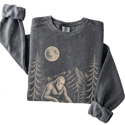 Pepper Comfort Colors sweatshirt featuring Bigfoot petting a Shih Tzu