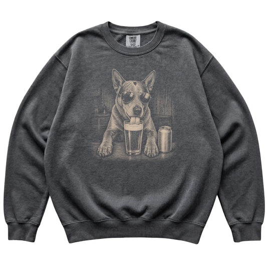 Pepper Blue Heeler drinking from a pint at a bar, laid flat