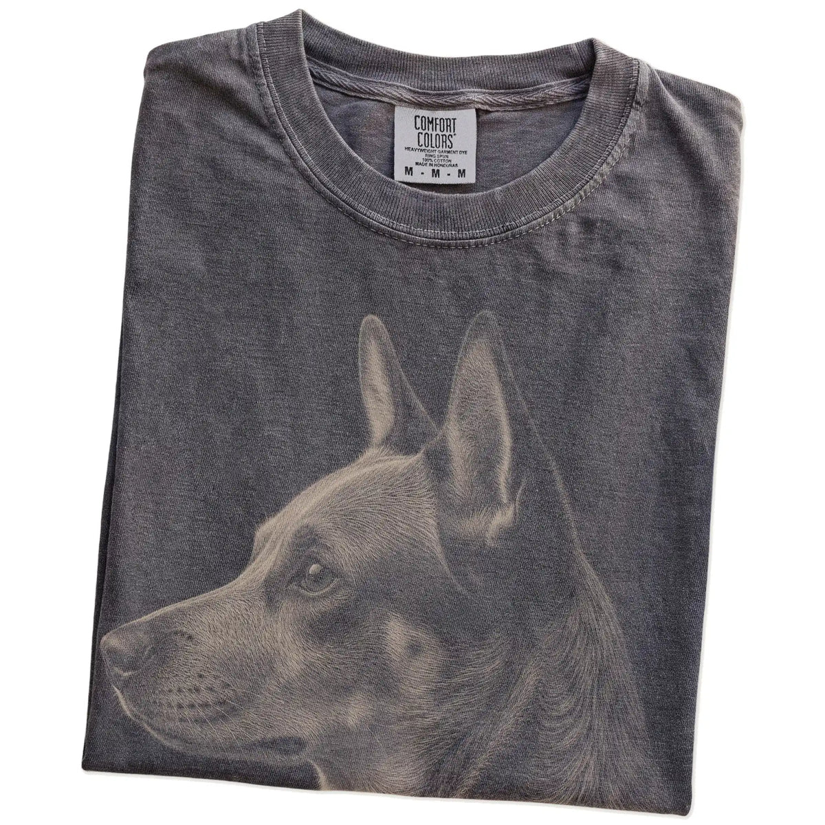 Folded Pepper Comfort Colors® T-shirt showing a detailed photographic portrait of a Blue Heeler
