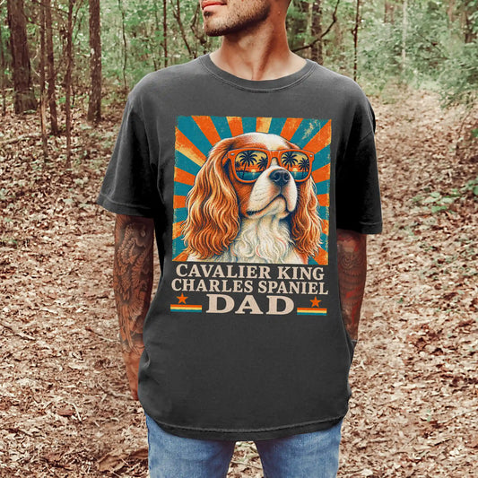 Retro Cavalier King Charles Spaniel Dad design on a Pepper Comfort Colors T-shirt worn by a model
