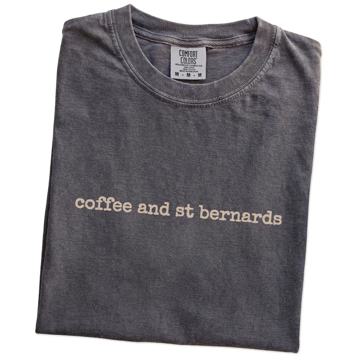 Folded Pepper Comfort Colors® T-shirt showing “coffee and st bernards” retro text