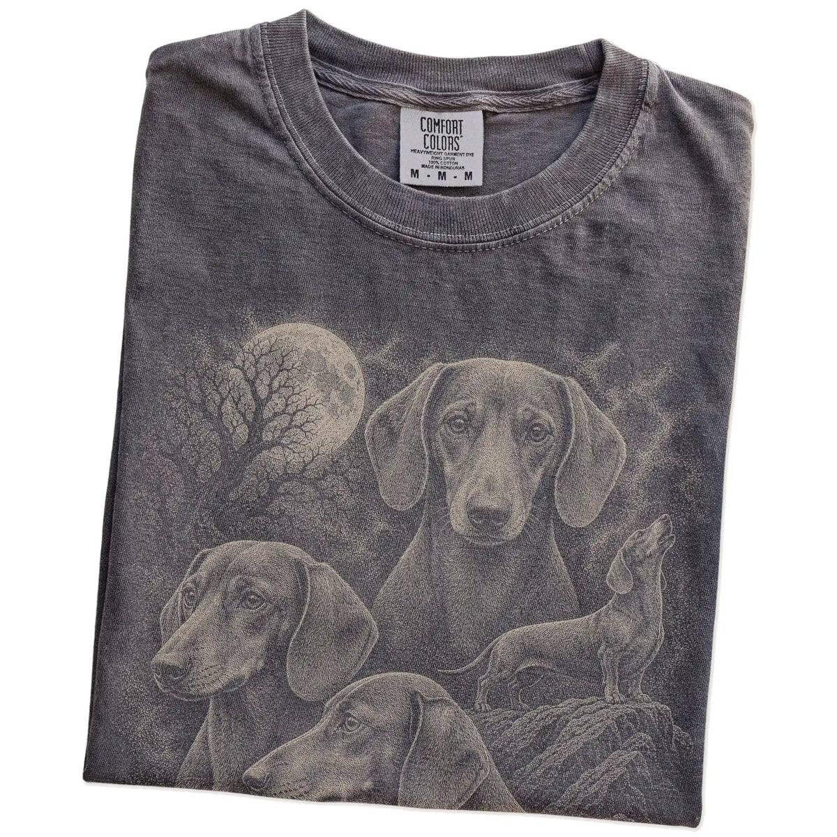 Folded Pepper Comfort Colors® T-shirt showing a vintage moon montage featuring Dachshund