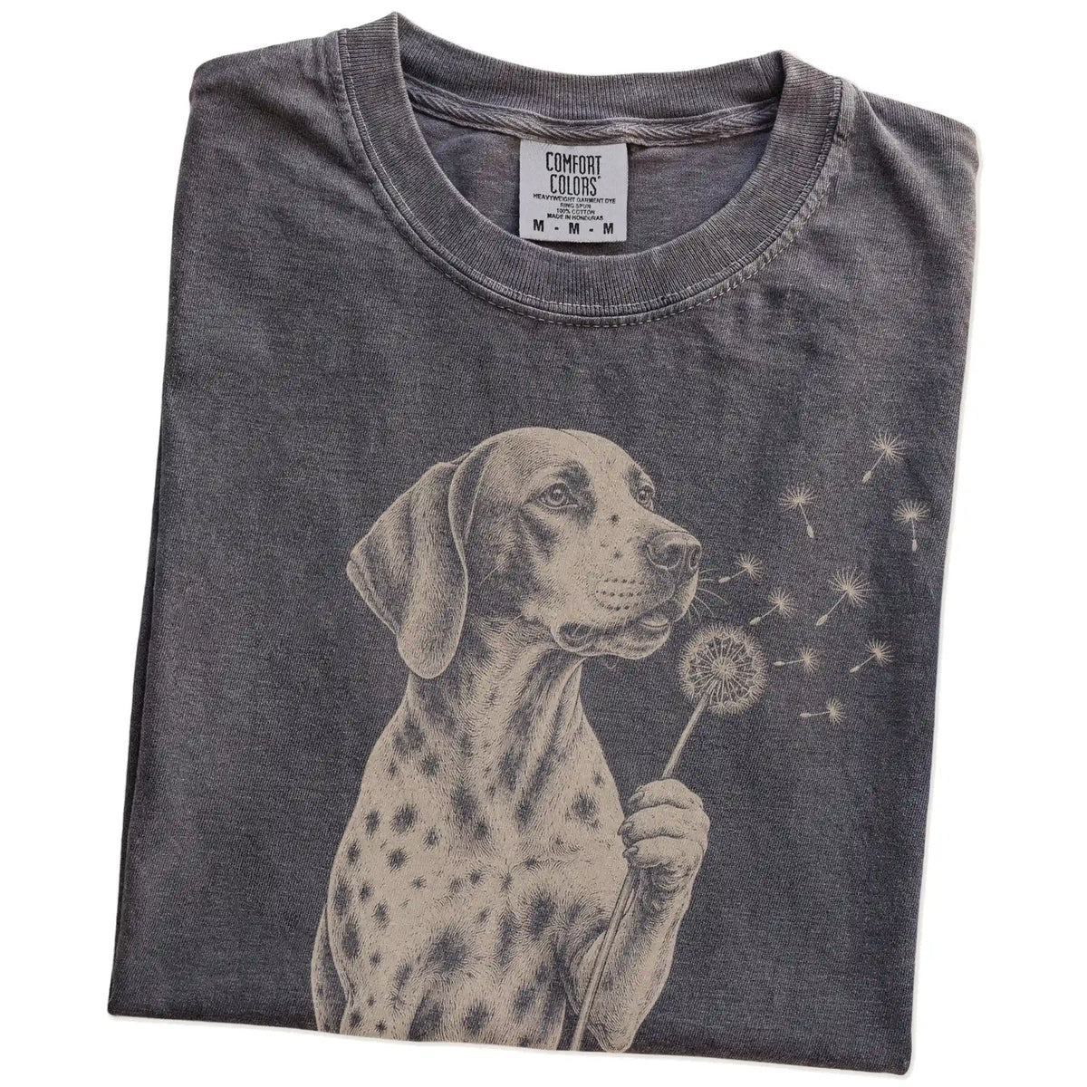 Folded Pepper Comfort Colors® T-shirt showing Pointer portrait with drifting dandelion seeds