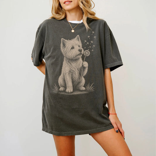 Model wearing a Pepper Comfort Colors® T-shirt showing Westie portrait with drifting dandelion seeds