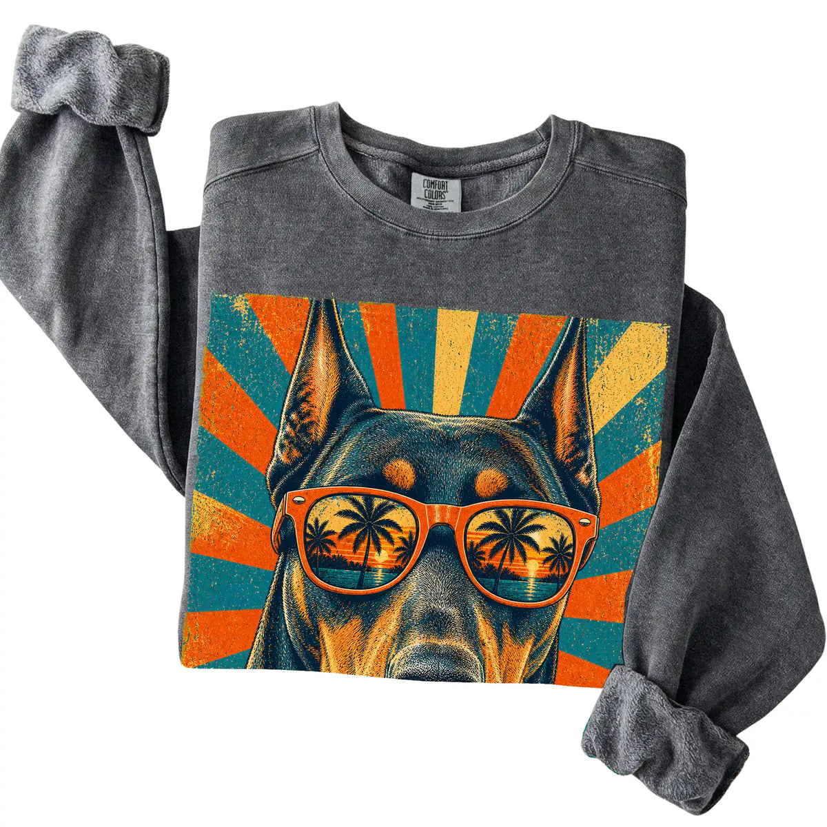 Folded Pepper Comfort Colors sweatshirt with a Retro Doberman Dad design