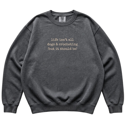 Pepper Dogs and Crocheting Comfort Colors sweatshirt laid flat