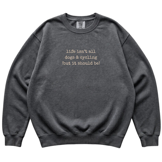 Pepper Dogs and Cycling Comfort Colors sweatshirt laid flat