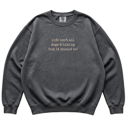 Pepper Dogs and Hiking Comfort Colors sweatshirt laid flat