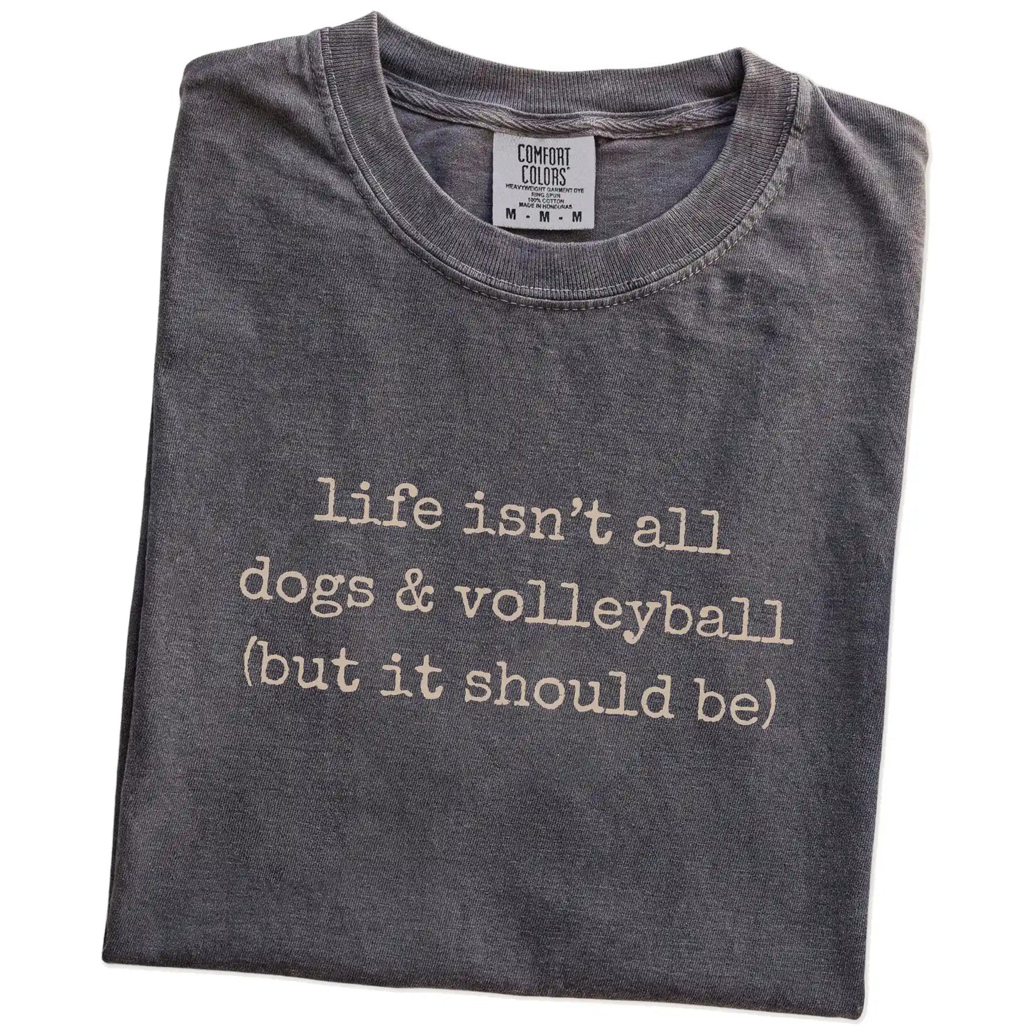 Folded Pepper Comfort Colors® T-shirt showing dog-themed volleyball graphic