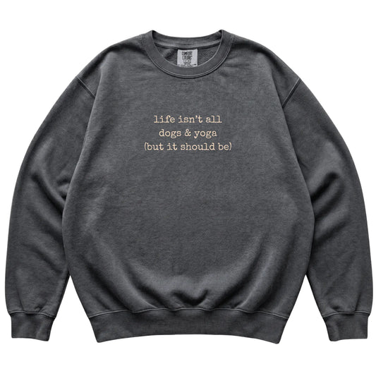 Pepper Dogs and Yoga Comfort Colors sweatshirt laid flat