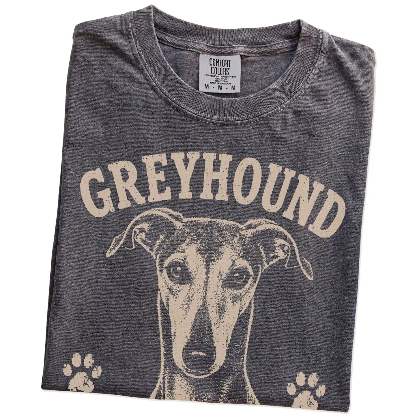 Folded Pepper Comfort Colors® T-shirt showing Greyhound design with “Fast When Necessary, Lazy By Choice” lettering