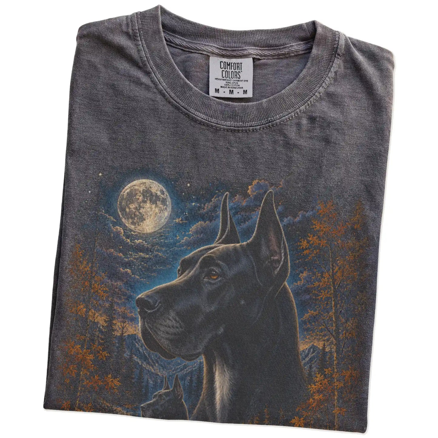Folded Pepper Comfort Colors® t-shirt showing Great Dane in a fall forest graphic