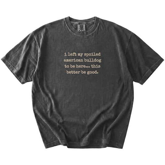 “I Left My Spoiled American Bulldog Home” saying on a Pepper Comfort Colors® T-shirt
