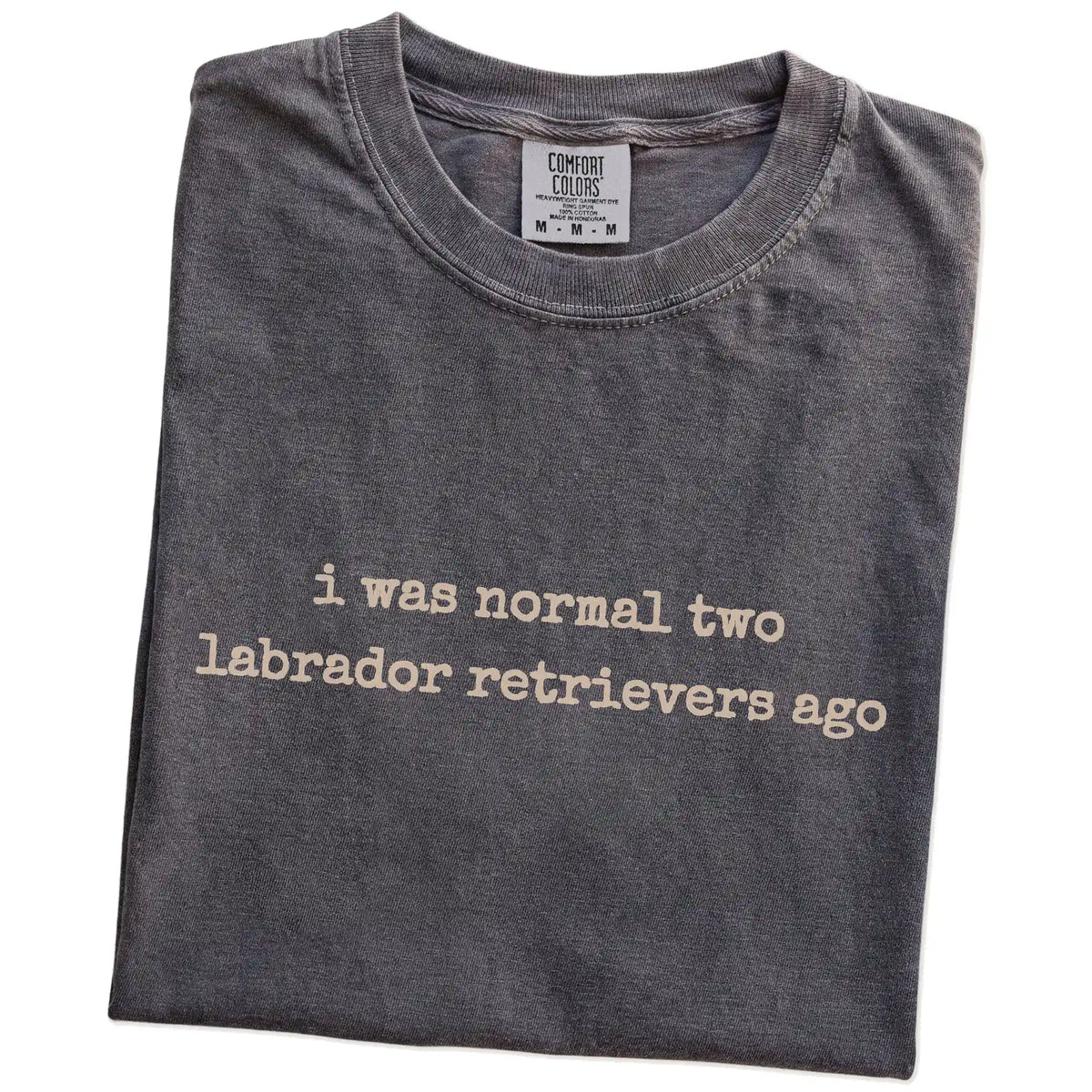 Folded Pepper Comfort Colors® T-shirt showing i was normal two labrador retrievers ago lettering