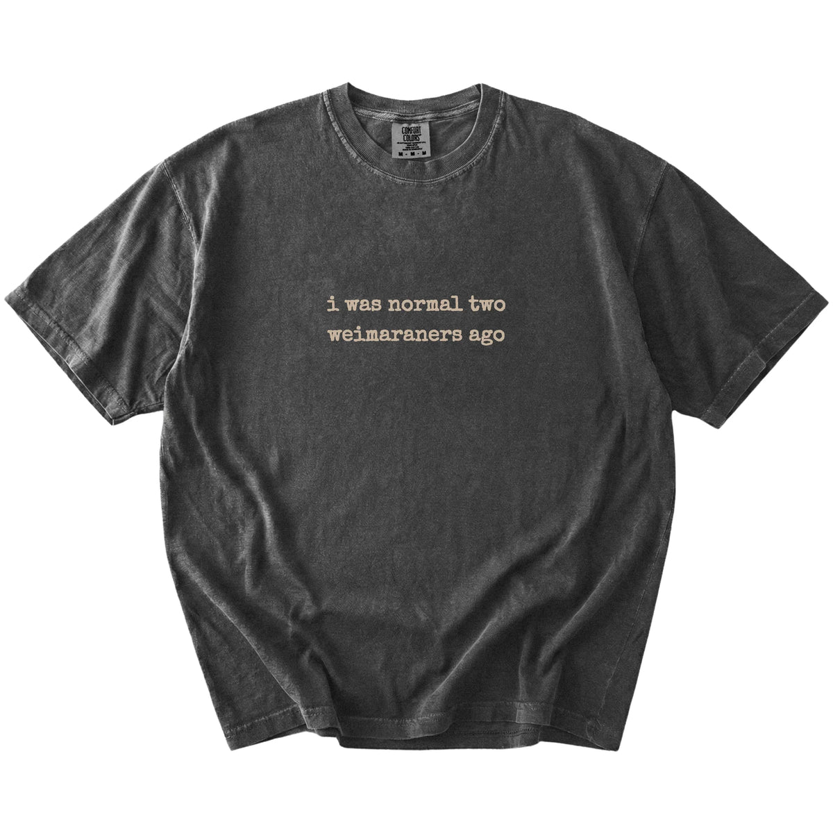 I Was Normal Two Weimaraners Ago lettering on a Pepper Comfort Colors® T-shirt