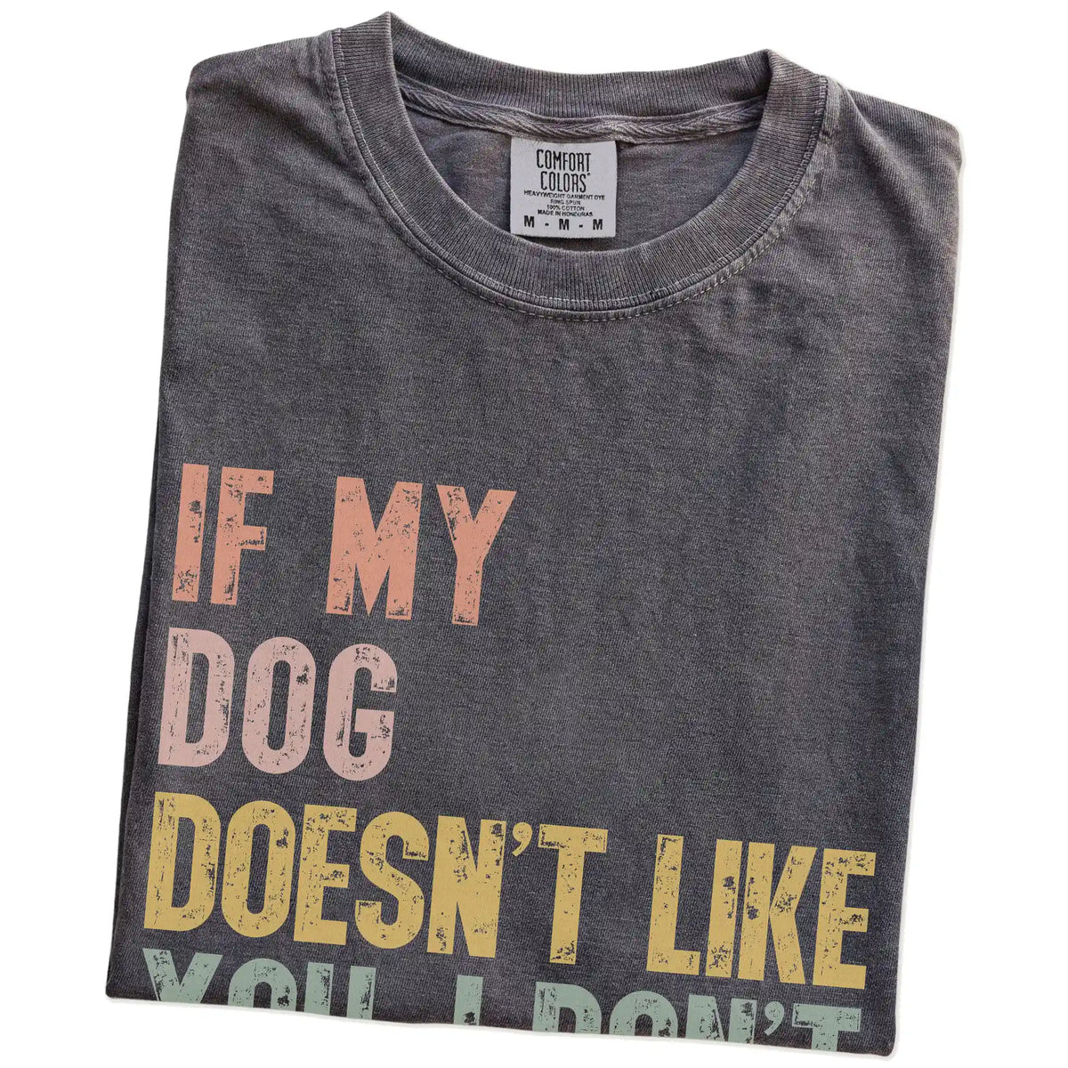 Folded Pepper Comfort Colors® T-shirt showing dogs with “If My Dog Doesn’t Like You, I Don’t Either” lettering