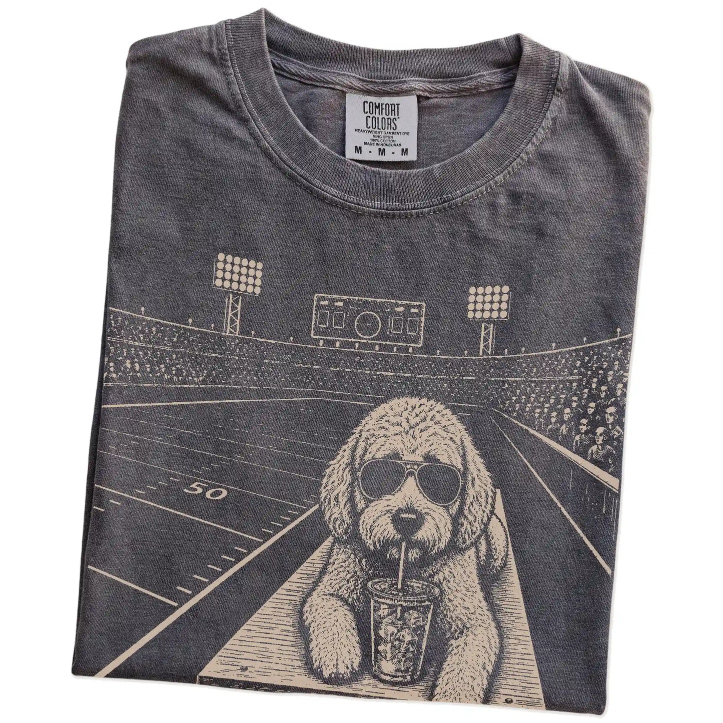 Folded Pepper Comfort Colors® T-shirt showing Labradoodle ready for football and tailgate season