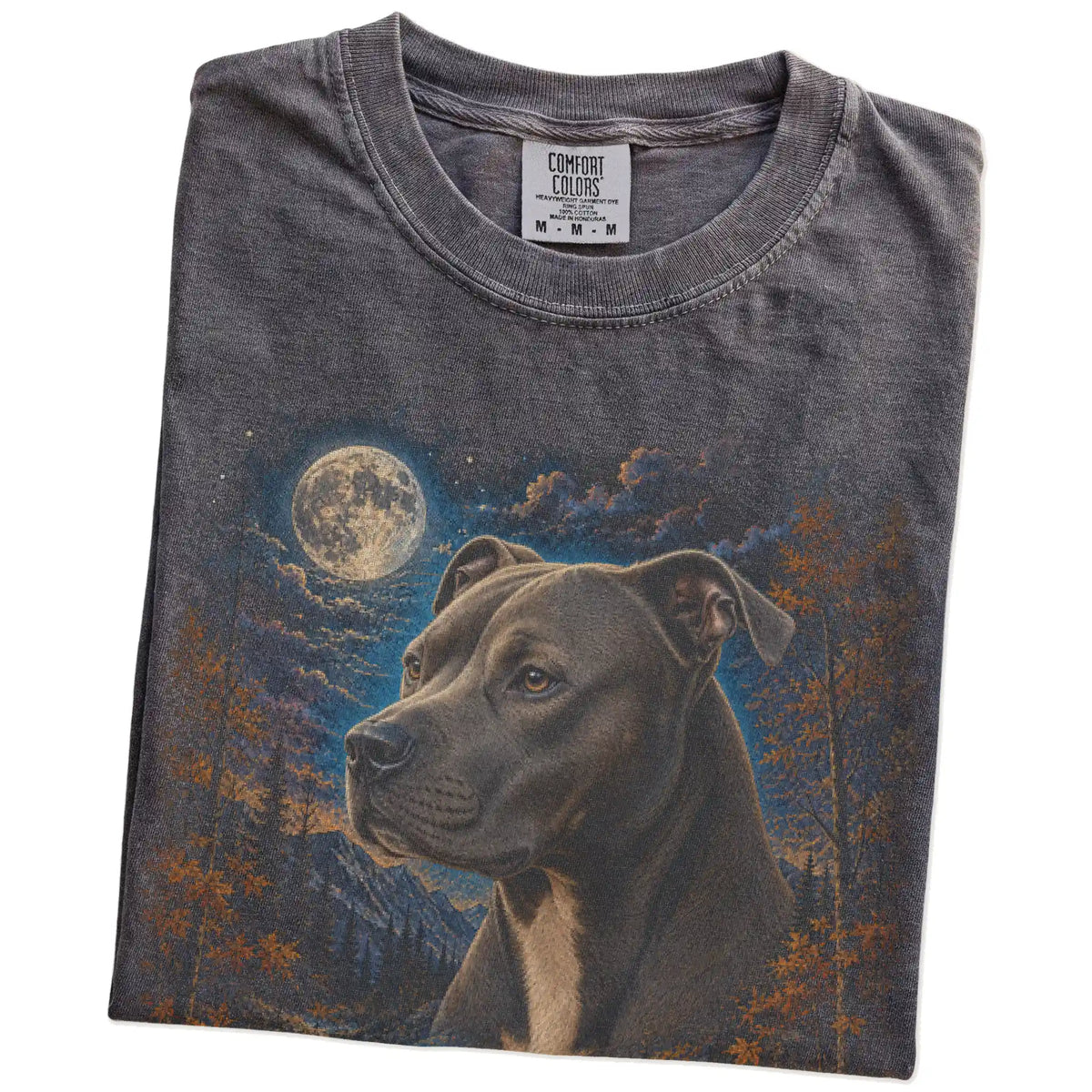 Folded Pepper Comfort Colors® t-shirt showing Pitbull in a fall forest graphic