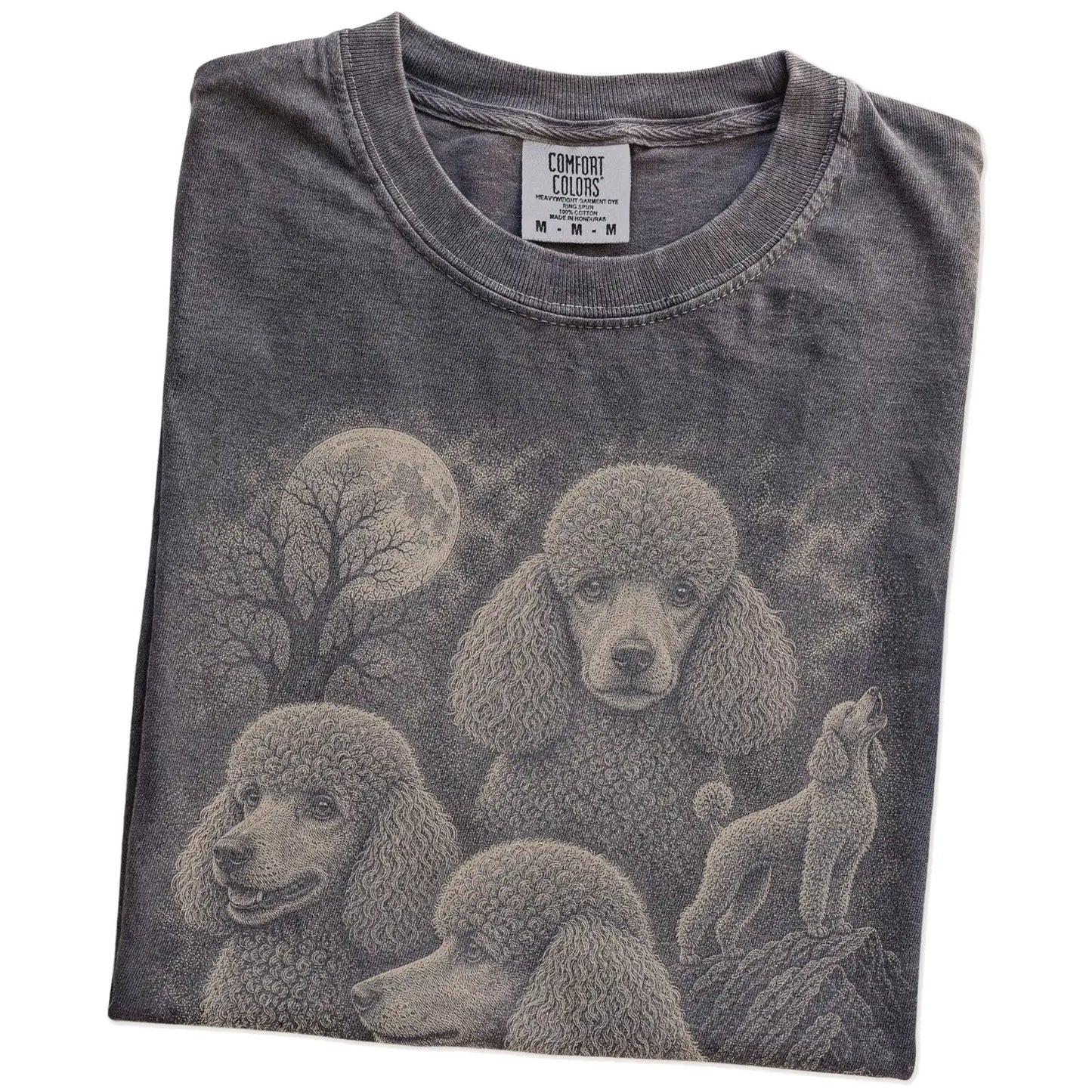 Folded Pepper Comfort Colors® T-shirt showing a vintage moon montage featuring Poodle