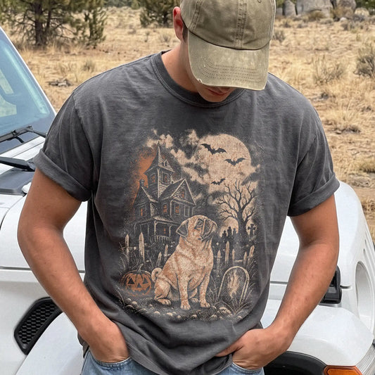 Model wearing a Pepper Comfort Colors® T-shirt showing Pug in a vintage haunted-house scene