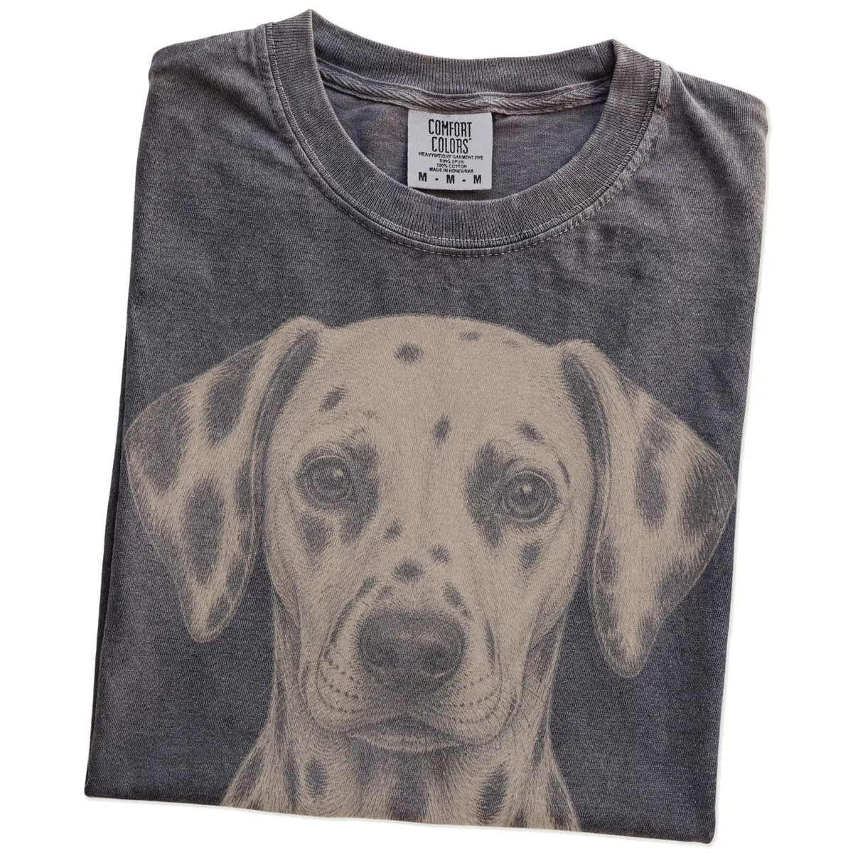 Folded Pepper Comfort Colors® T-shirt showing a realistic drawing of a Dalmatian