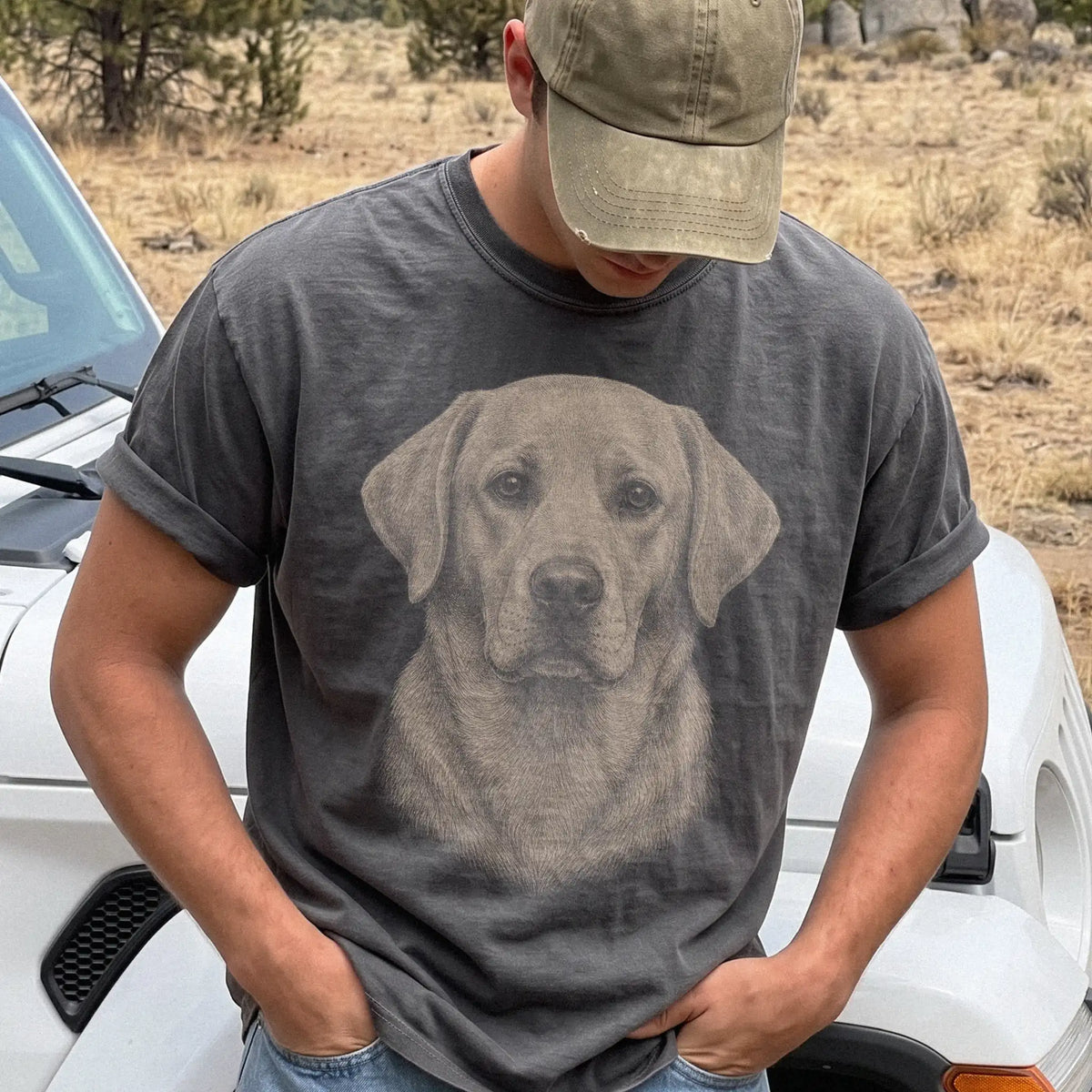 Model wearing a Pepper Comfort Colors® T-shirt with a realistic drawing of a Labrador Retriever