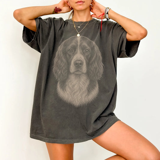Model wearing a Pepper Comfort Colors® T-shirt with a realistic drawing of a Springer Spaniel