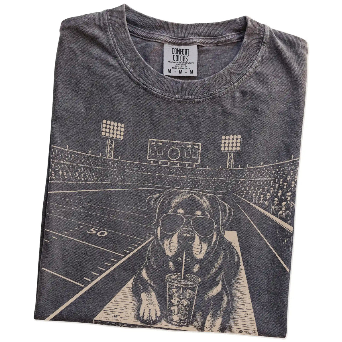 Folded Pepper Comfort Colors® T-shirt showing Rottweiler ready for football and tailgate season