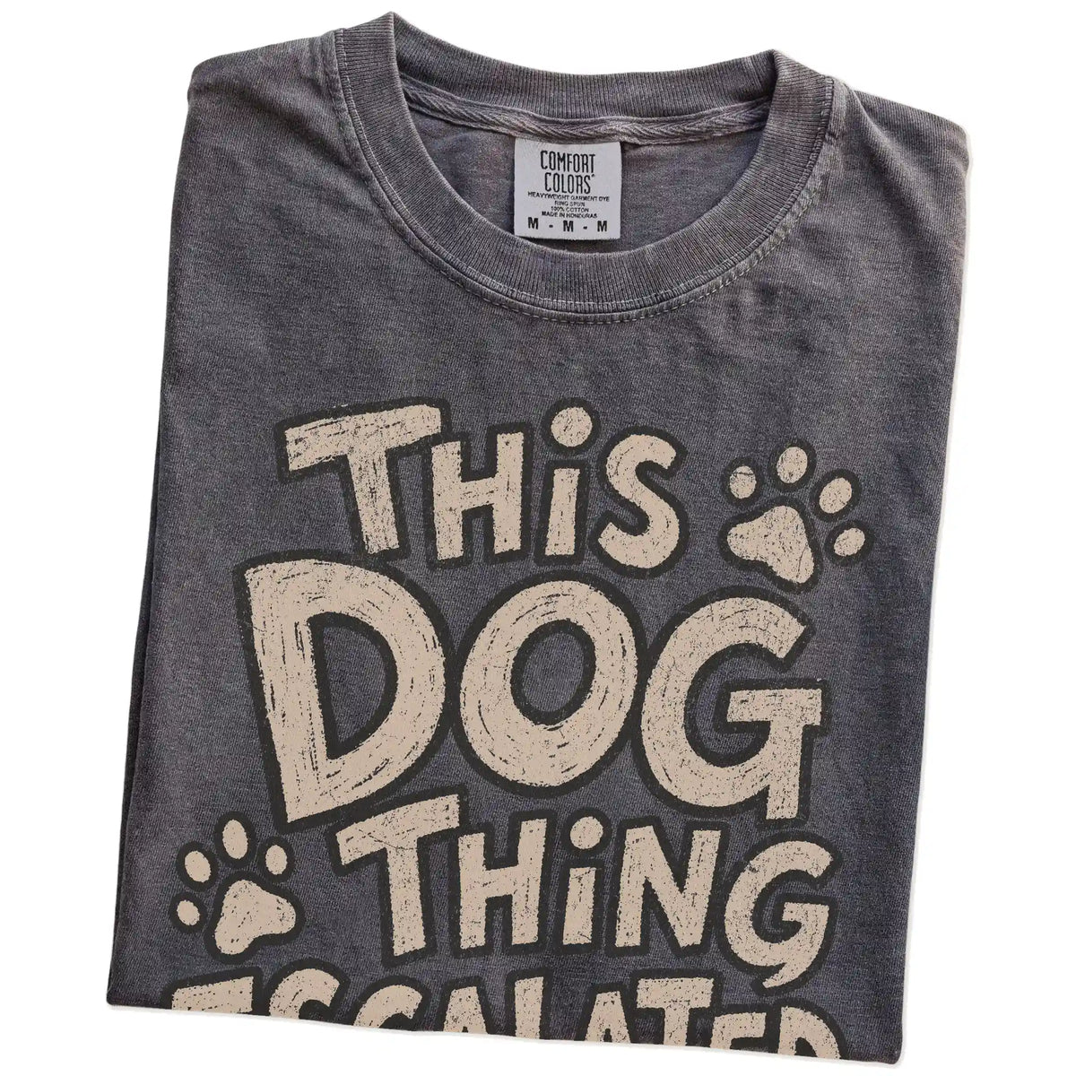 Folded Pepper Comfort Colors® T-shirt showing this dog thing escalated quickly lettering