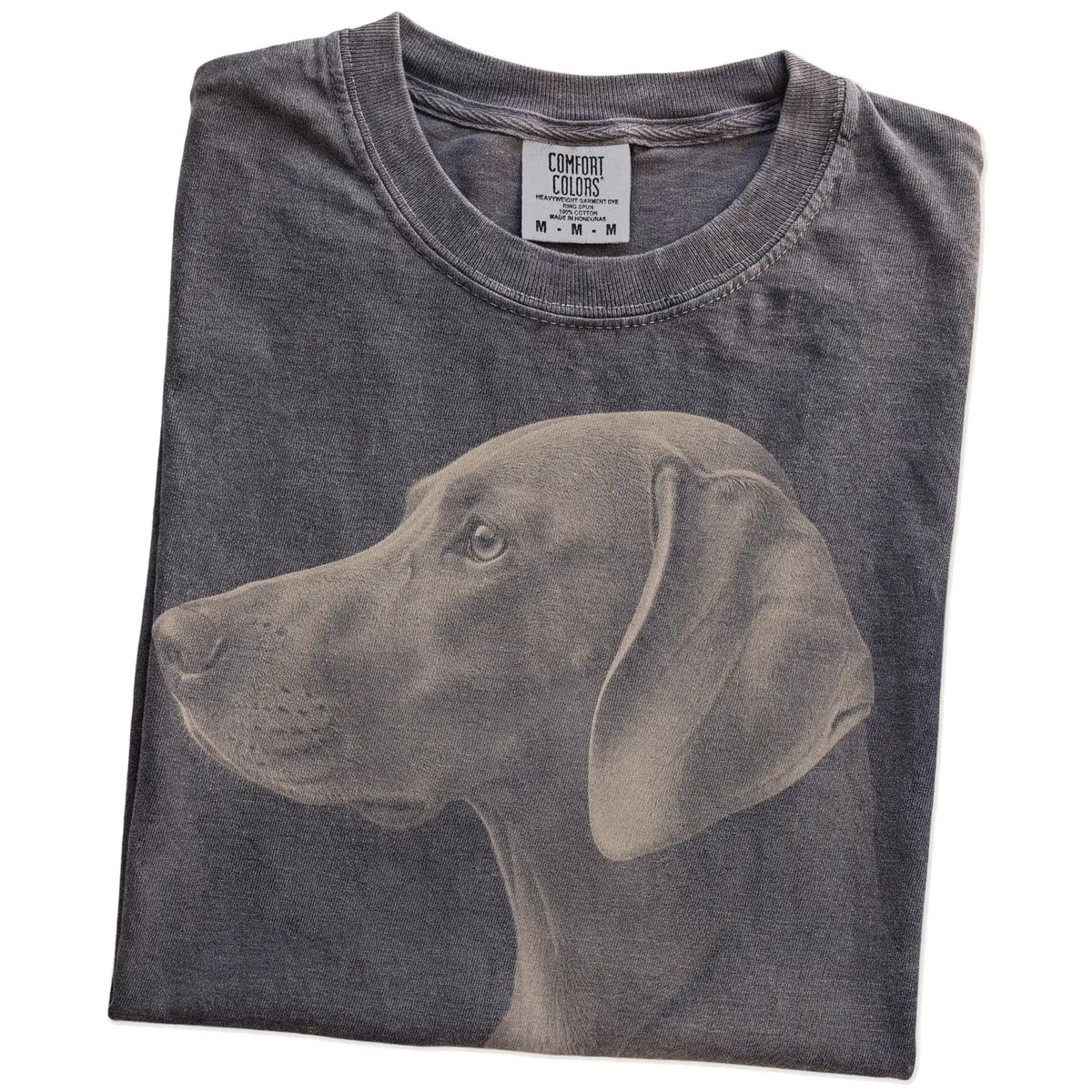 Folded Pepper Comfort Colors® T-shirt showing a detailed photographic portrait of a Weimaraner